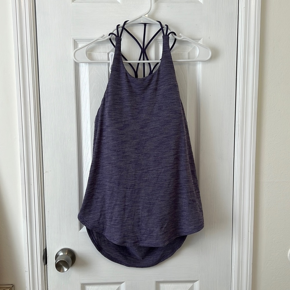 lululemon workout shirt with built in bra and low cut back. Size 8.